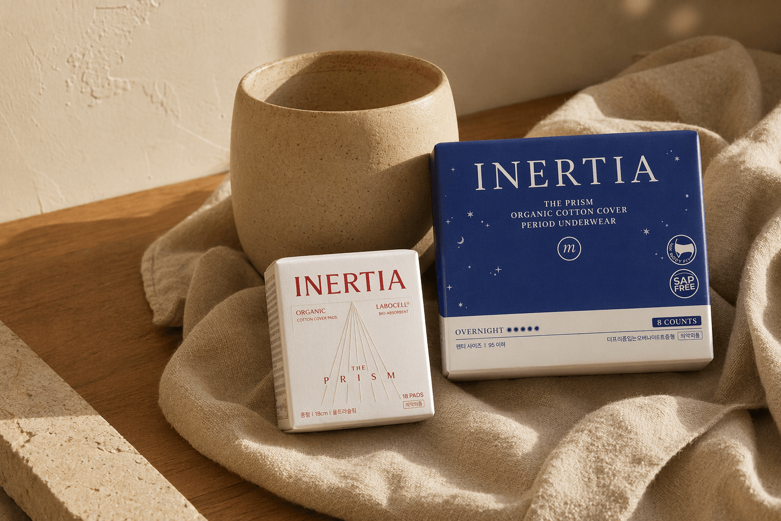 Inertia monthly care set with organic cotton pads and inositol